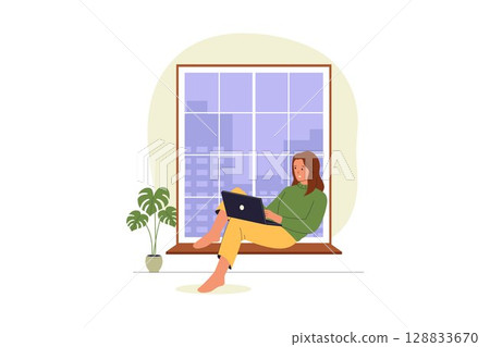 Woman Working on Laptop by the Window Seat 128833670