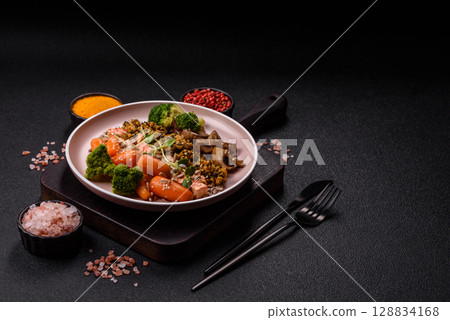 Food bowl with tofu, quinoa, broccoli and carrots, microgreens Food bowl with tofu, quinoa, broccoli and carrots, microgreens 128834168