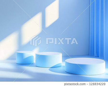 A serene product display featuring a variety of white cylindrical and rectangular podiums and a large circle against a soft blue arched backdrop. 128834220