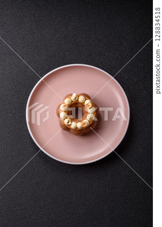 Round chocolate tart or pie with cream berry filling 128834518