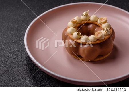 Round chocolate tart or pie with cream berry filling 128834520