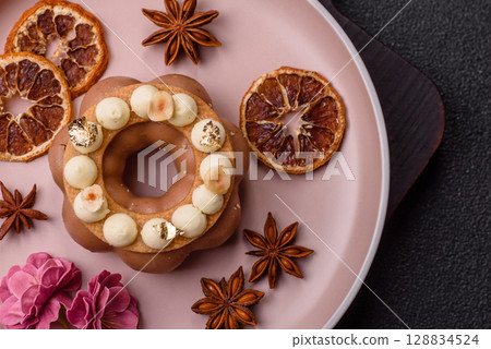 Round chocolate tart or pie with cream berry filling 128834524