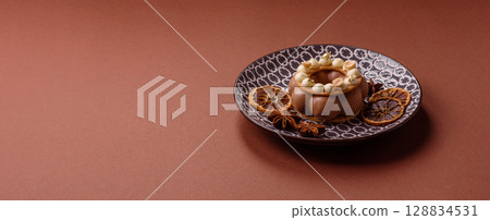 Round chocolate tart or pie with cream berry filling 128834531