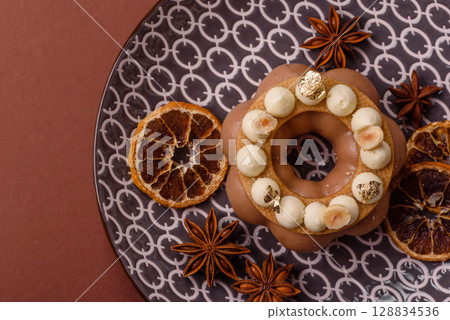 Round chocolate tart or pie with cream berry filling 128834536