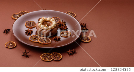 Round chocolate tart or pie with cream berry filling 128834555