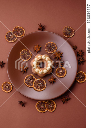 Round chocolate tart or pie with cream berry filling Round chocolate tart or pie with cream berry filling 128834557