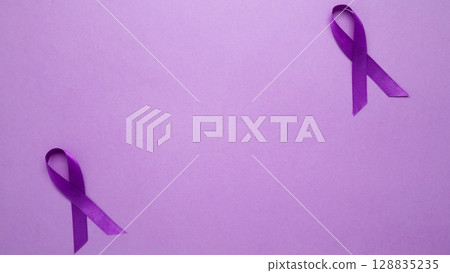 Purple ribbon held, symbol of support. Purple Epilepsy Awareness Day Purple ribbon held, symbol of support. Purple Epilepsy Awareness Day 128835235