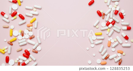Concept of healthcare and medicine. Various medication tablets and capsules 128835253
