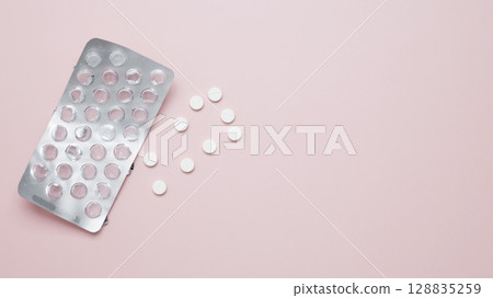 Concept of medicine, healthcare, and pharmaceutical industry. Blister of tablets with pills 128835259