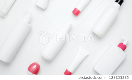 Bottles and tubes with branding mock up. Cosmetic beauty products. Skin care and beauty concept 128835285