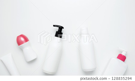 Skin care and beauty concept. Cosmetic beauty products. Bottles and tubes with branding mock up 128835294