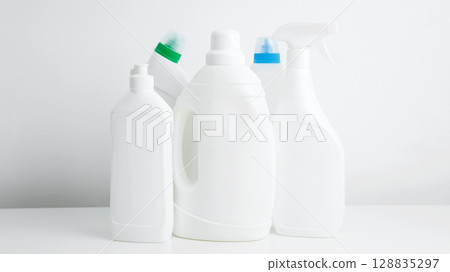 Household cleaning and hygiene concept. Various cleaning supplies branding mockup, symbolizing spring cleaning Household cleaning and hygiene concept. Various cleaning supplies branding mockup, symbolizing spring cleaning 128835297