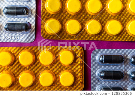 Lots of pills in a blister packs. Medical drug. Medicine. Medical background 128835366