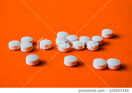 Lots of pills in a blister packs. Medical drug. Medicine. Medical background Lots of pills in a blister packs. Medical drug. Medicine. Medical background 128835388
