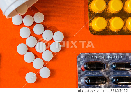 Lots of pills in a blister packs. Medical drug. Medicine. Medical background 128835412