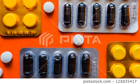 Lots of pills in a blister packs. Medical drug. Medicine. Medical background 128835417