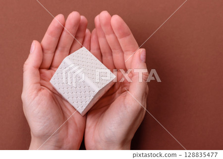 Home, house, buying property for business or life. Concept with human hand 128835477