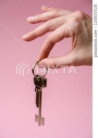 Home, house, buying property for business or life. Concept with human hand Home, house, buying property for business or life. Concept with human hand 128835528