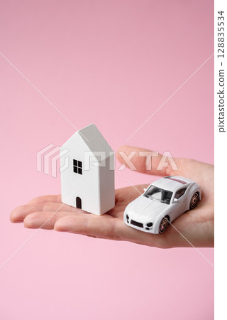 Home, house, buying property for business or life. Concept with human hand Home, house, buying property for business or life. Concept with human hand 128835534
