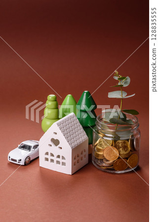 Coins and plant in a jar as a concept of savings and financial investment 128835555