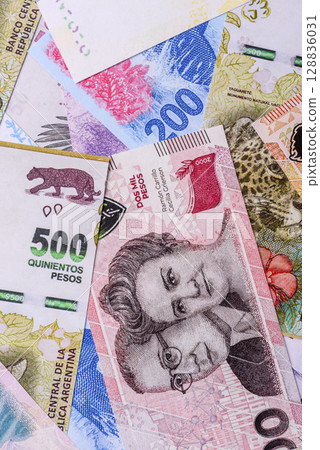 Background of Argentine peso paper money, notes with different denominations 128836031