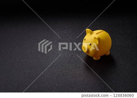 Piggy bank as a financial conceptual background with coins, doing business, saving money 128836060