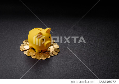Piggy bank as a financial conceptual background with coins, doing business, saving money 128836072