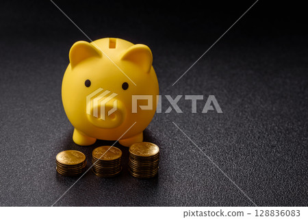 Piggy bank as a financial conceptual background with coins, doing business, saving money Piggy bank as a financial conceptual background with coins, doing business, saving money 128836083