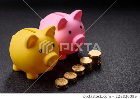 Piggy bank as a financial conceptual background with coins, doing business, saving money Piggy bank as a financial conceptual background with coins, doing business, saving money 128836099