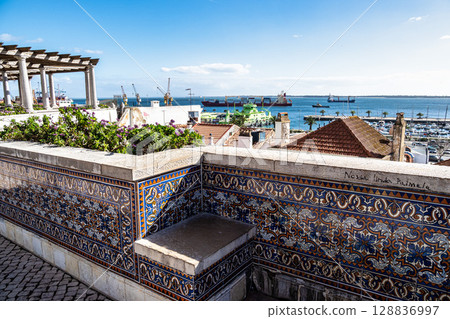 Narrow street Travesia Porta do Sol in the old town of Setubal in Portugal 128836997