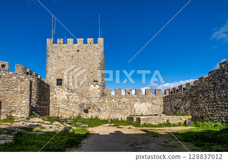 Moorish Sesimbra castle with walls and wall walk in Sesimbra, Portugal Moorish Sesimbra castle with walls and wall walk in Sesimbra, Portugal 128837012