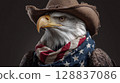 Bald eagle in cowboy hat and American flag scarf celebrates Independence Day 128837086
