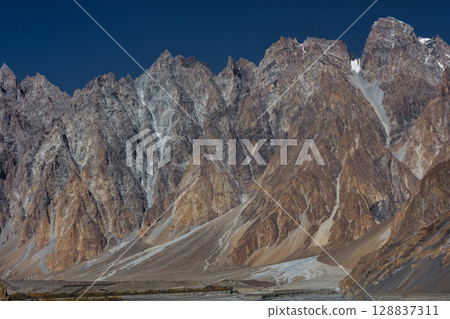 The autumn scenery with Tupopdan, Passu Cathedral or Passu Cones, is a mountain in northern Pakistan 128837311