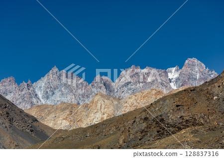 The autumn scenery with Tupopdan, Passu Cathedral or Passu Cones, is a mountain in northern Pakistan 128837316