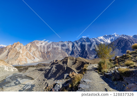 The autumn scenery with Tupopdan, Passu Cathedral or Passu Cones, is a mountain in northern Pakistan 128837326
