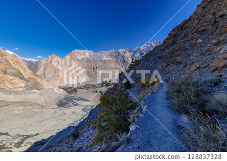The autumn scenery with Tupopdan, Passu Cathedral or Passu Cones, is a mountain in northern Pakistan The autumn scenery with Tupopdan, Passu Cathedral or Passu Cones, is a mountain in northern Pakistan 128837328