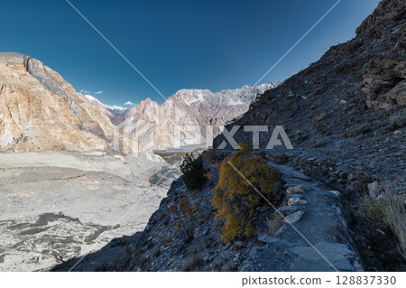 The autumn scenery with Tupopdan, Passu Cathedral or Passu Cones, is a mountain in northern Pakistan The autumn scenery with Tupopdan, Passu Cathedral or Passu Cones, is a mountain in northern Pakistan 128837330