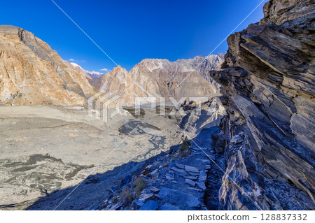 The autumn scenery with Tupopdan, Passu Cathedral or Passu Cones, is a mountain in northern Pakistan The autumn scenery with Tupopdan, Passu Cathedral or Passu Cones, is a mountain in northern Pakistan 128837332