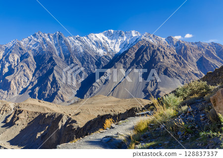The autumn scenery with Tupopdan, Passu Cathedral or Passu Cones, is a mountain in northern Pakistan 128837337