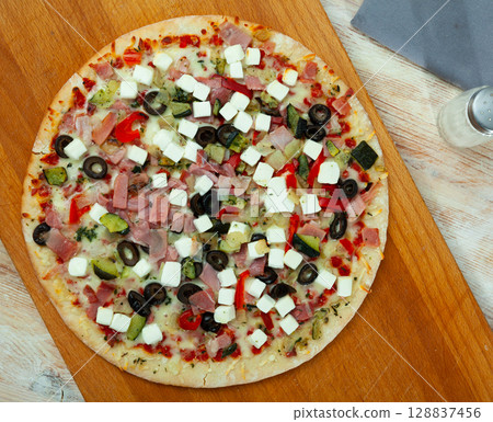 Traditional dish of Italian cuisine is Pizza Traditional dish of Italian cuisine is Pizza 128837456