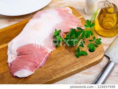 Fresh meat, raw pork Secreto steak and spices prepared for cooking 128837499