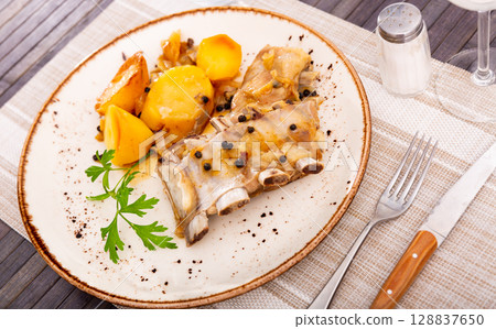 juicy and fatty fried pork ribs with crust, seasoned with coarse salt juicy and fatty fried pork ribs with crust, seasoned with coarse salt 128837650