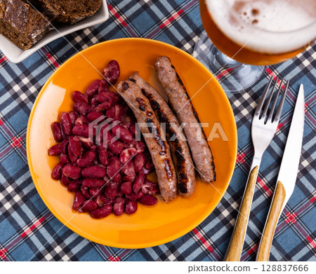 Sausages with red beans, typical Catalan dish butifarra con alubias Sausages with red beans, typical Catalan dish butifarra con alubias 128837666