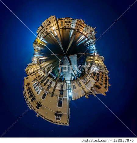 Venice Grand Canal at night with historic buildings, gondolas, and reflections under a starry sky. 128837976