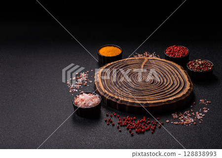 Wooden cutting board blank as a backdrop for cooking in the kitchen 128838993