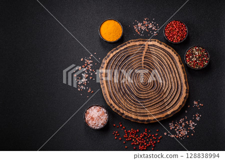 Wooden cutting board blank as a backdrop for cooking in the kitchen 128838994