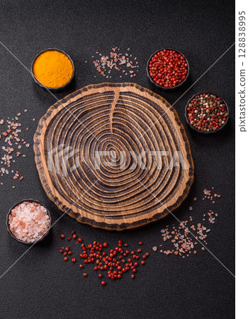 Wooden cutting board blank as a backdrop for cooking in the kitchen 128838995
