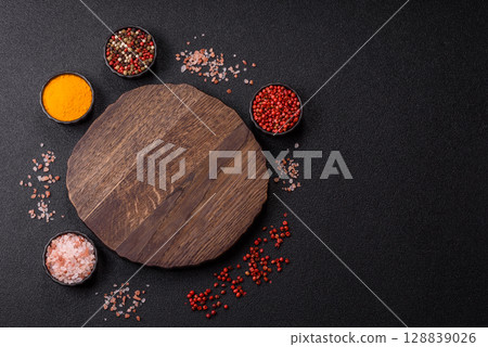 Wooden cutting board blank as a backdrop for cooking in the kitchen Wooden cutting board blank as a backdrop for cooking in the kitchen 128839026