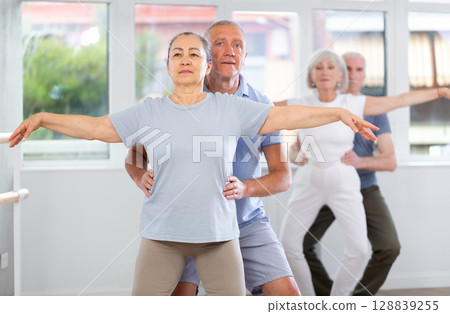 Ballet performed by elderly people in ballet studio Ballet performed by elderly people in ballet studio 128839255