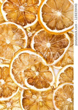 Sun-dried (dried) lemons closeup Sun-dried (dried) lemons closeup 128839440
